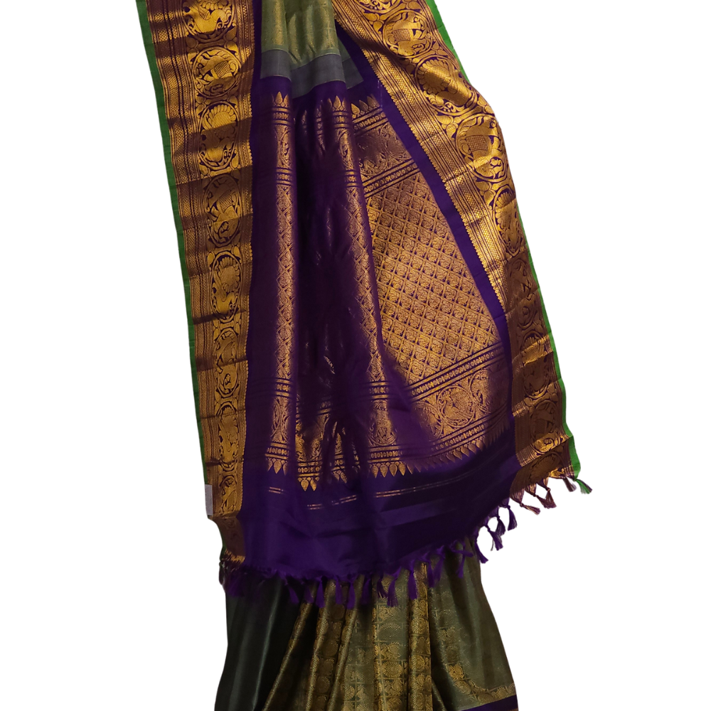 Elegant Telugu traditional Gadwal silk saree in mint green with dark blue blouse piece

