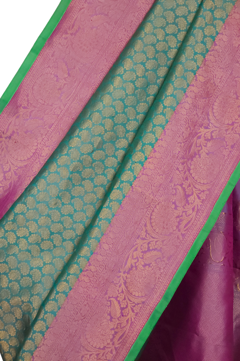Elegant Telugu traditional Gadwal silk saree in mint green with lavender blouse piece

