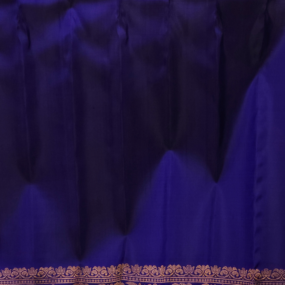 Elegant Telugu traditional Gadwal silk saree in navy blue with matching blouse piece

