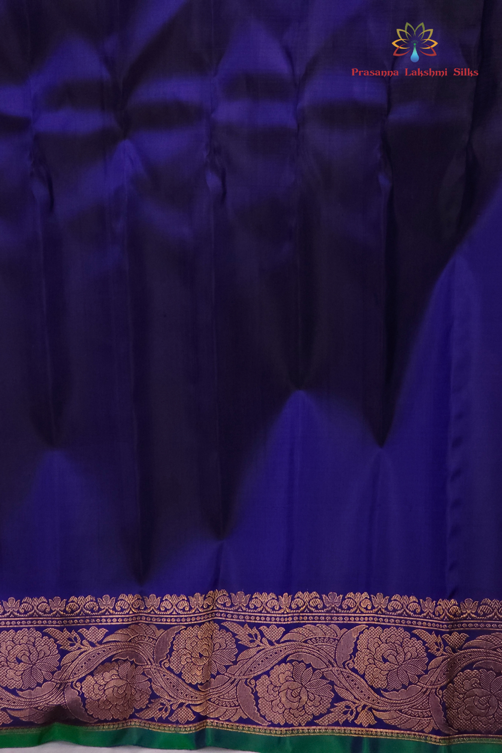 Elegant Telugu traditional Gadwal silk saree in navy blue with matching blouse piece

