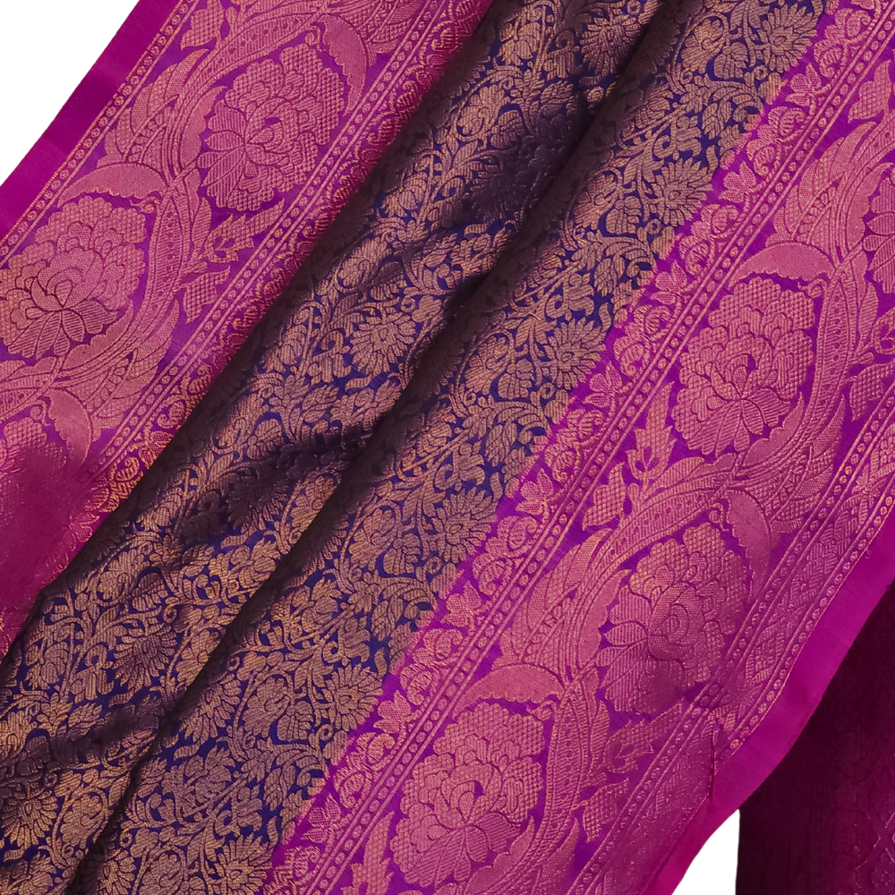 Elegant Telugu traditional Gadwal silk saree in navy blue with purple blouse piece

