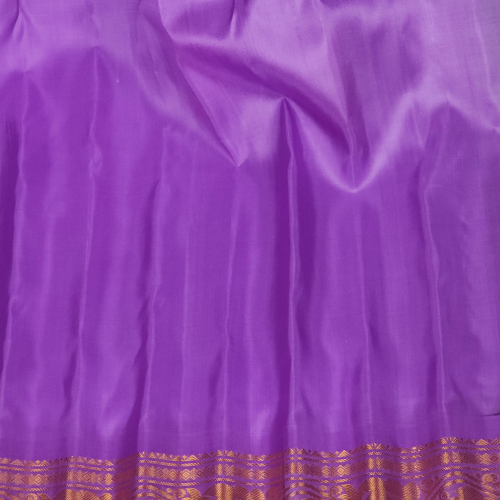 Elegant black pure silk Gadwal saree with lavender blouse piece from Prasanna Lakshmi Silks

