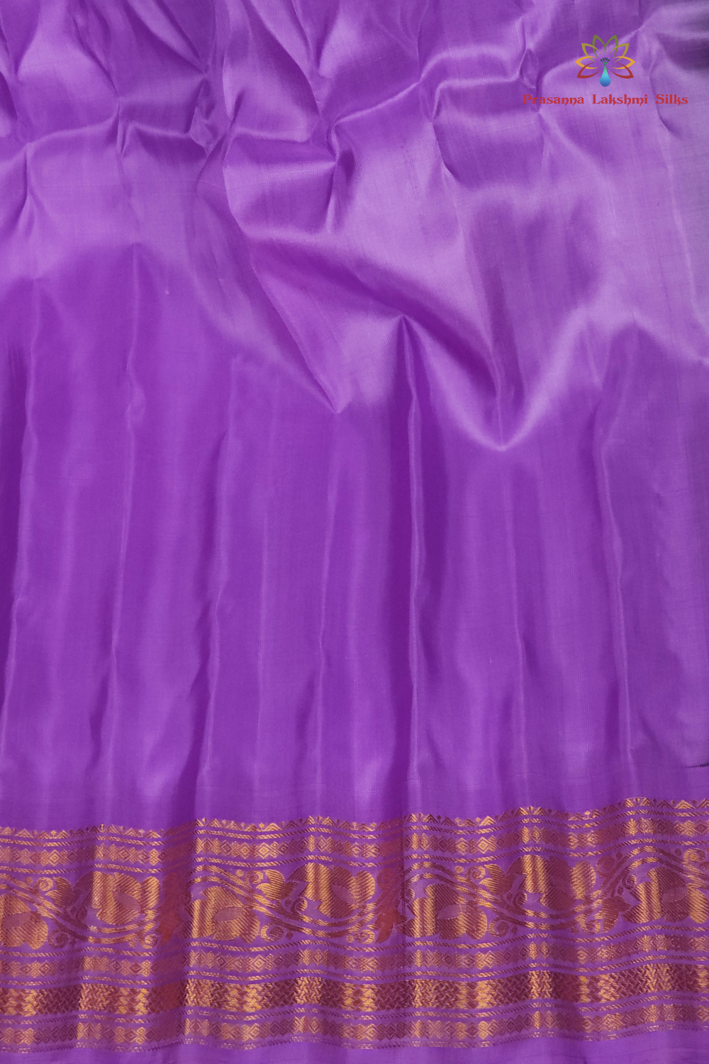 Elegant black pure silk Gadwal saree with lavender blouse piece from Prasanna Lakshmi Silks

