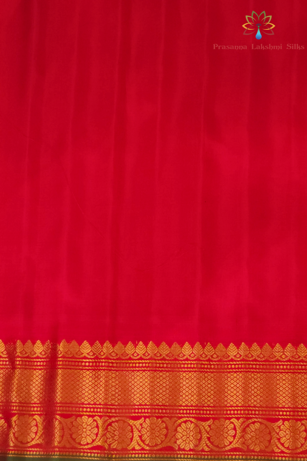 Elegant black pure silk Gadwal saree with red blouse piece from Prasanna Lakshmi Silks

