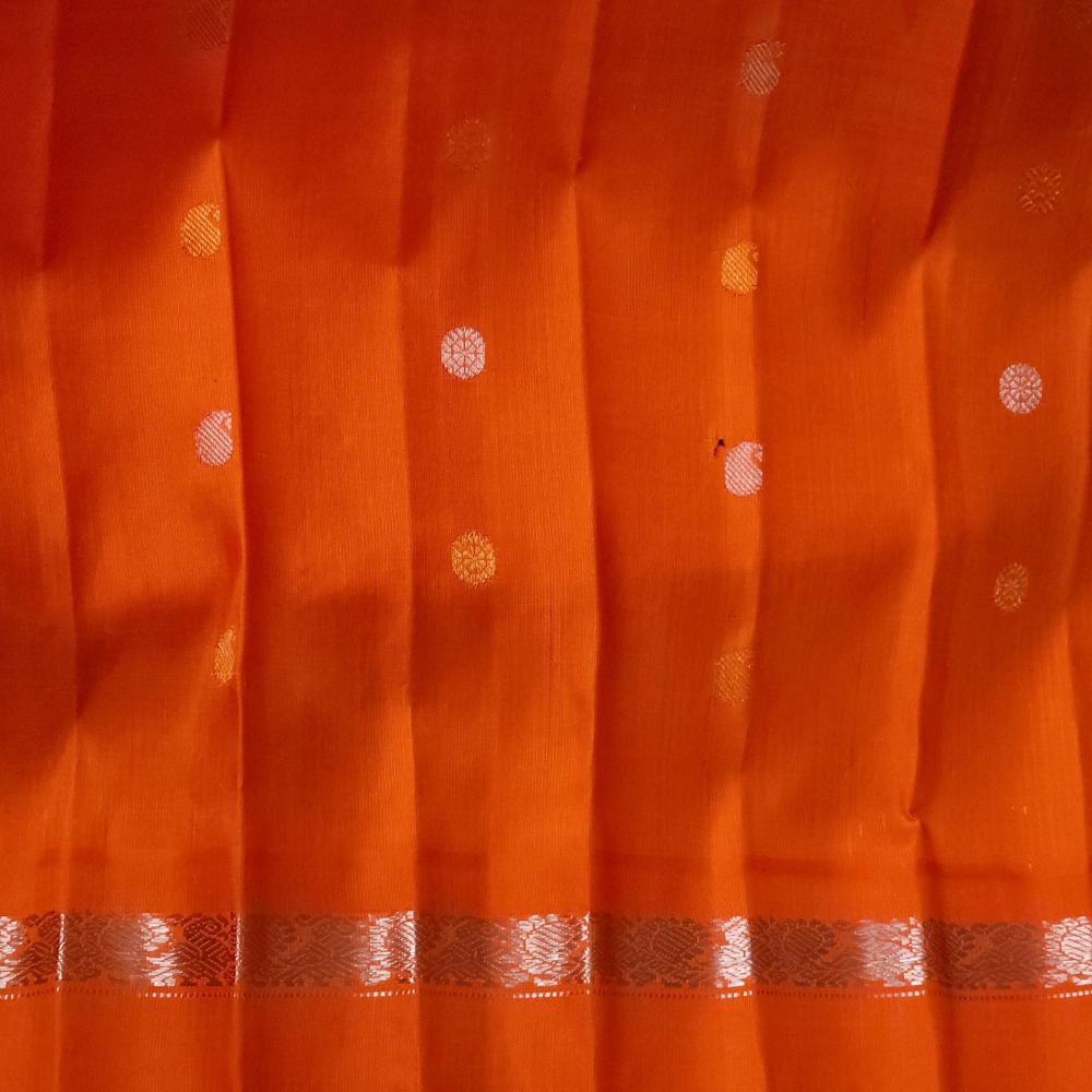 Elegant deep violet pure silk Gadwal saree with orange blouse piece from Prasanna Lakshmi Silks

