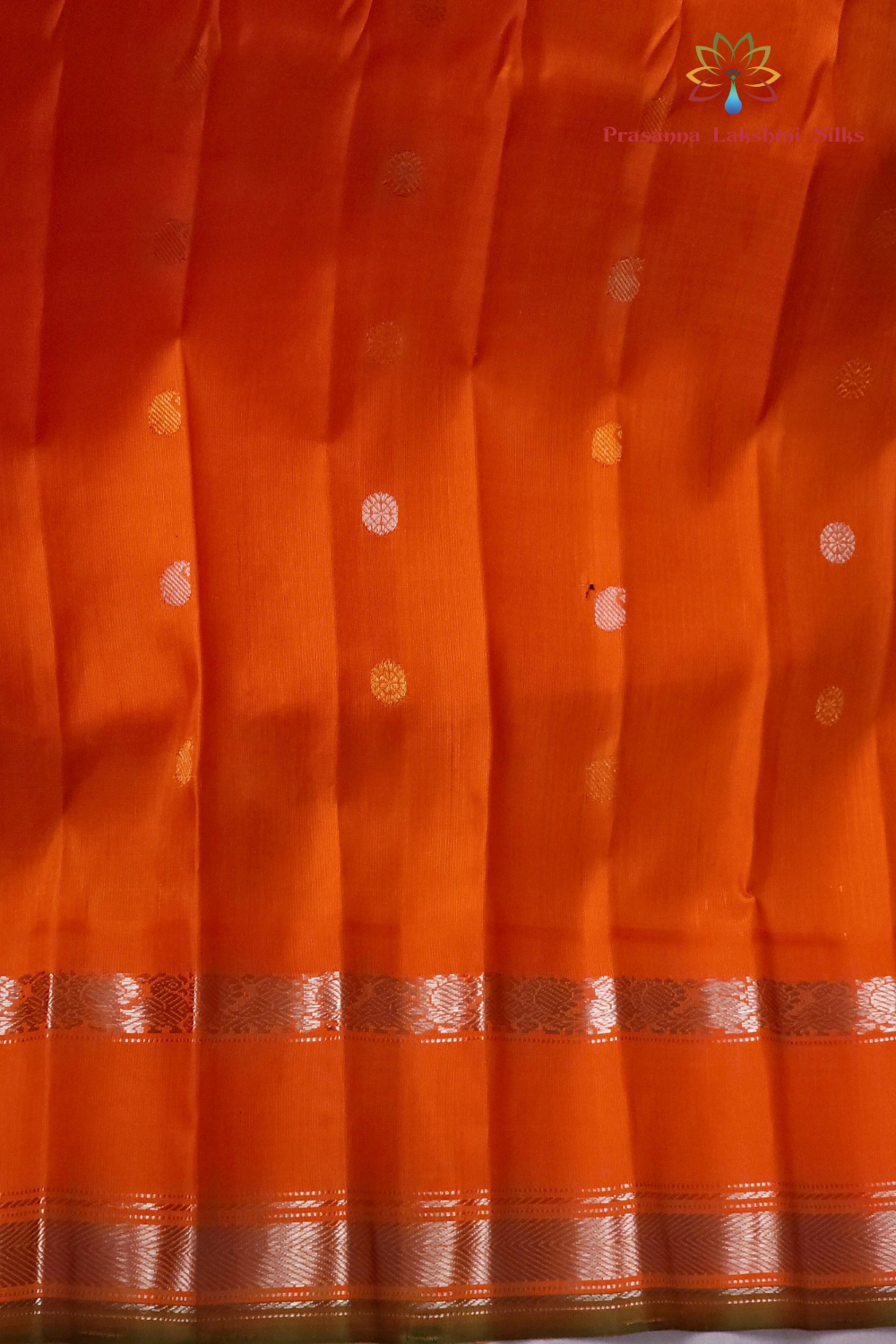 Elegant deep violet pure silk Gadwal saree with orange blouse piece from Prasanna Lakshmi Silks

