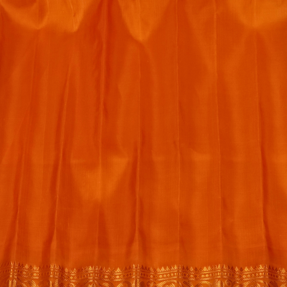 Elegant purple pure silk Gadwal saree with orange blouse piece from Prasanna Lakshmi Silks

