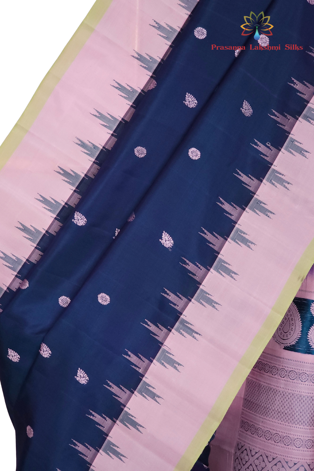 Festive peacock blue pure Gadwal silk saree with lotus pink border from Prasanna Lakshmi Silks
