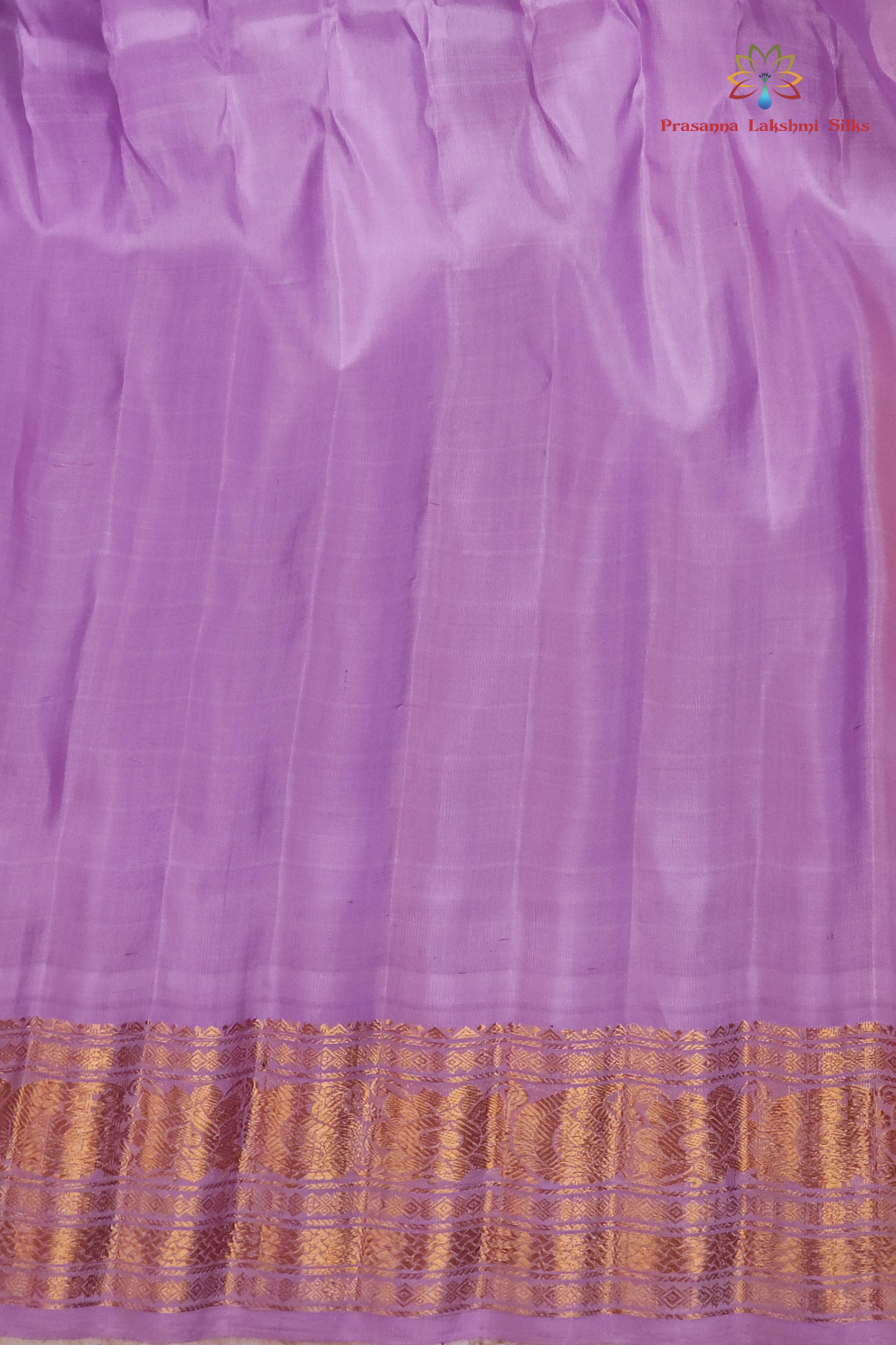 Festive yellow pure silk Gadwal saree with lavender blouse piece from Prasanna Lakshmi Silks

