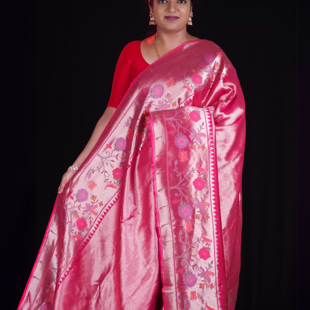 "Pink tissue saree with floral pallu and running blouse"