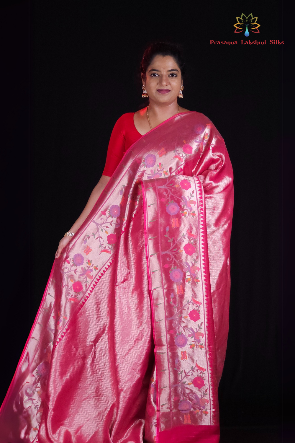 "Pink tissue saree with floral pallu and running blouse"