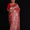 "Red tissue saree with floral pallu and running blouse"