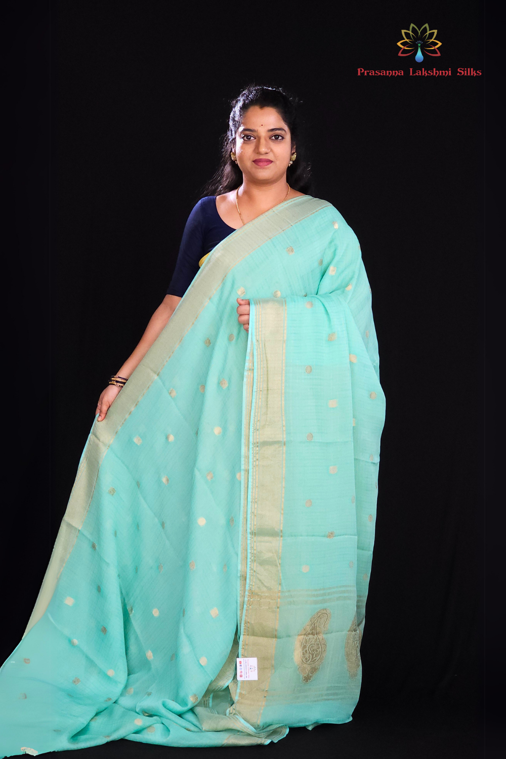 Sea Foam green "Banaras silk saree with allover Checks and tissue pallu