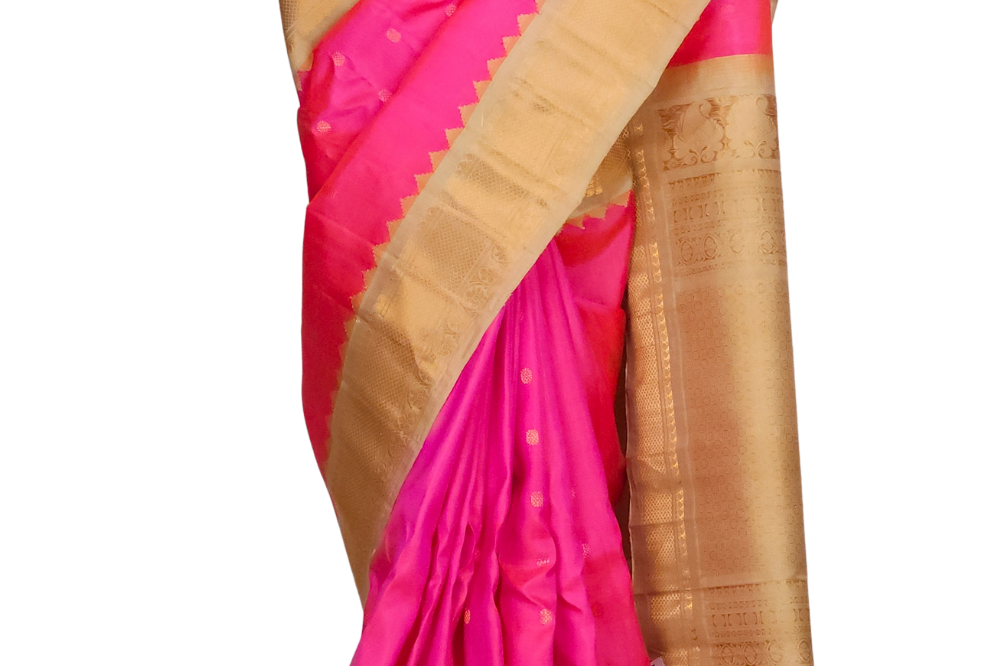 Hot pink handloom Gadwal pure silk saree with cream zari woven border and rich brocade pallu
