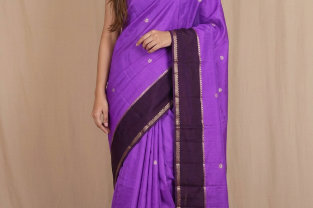 Banarasi Munga silk saree with all-over zari woven floral motifs and rich brocade pallu.
