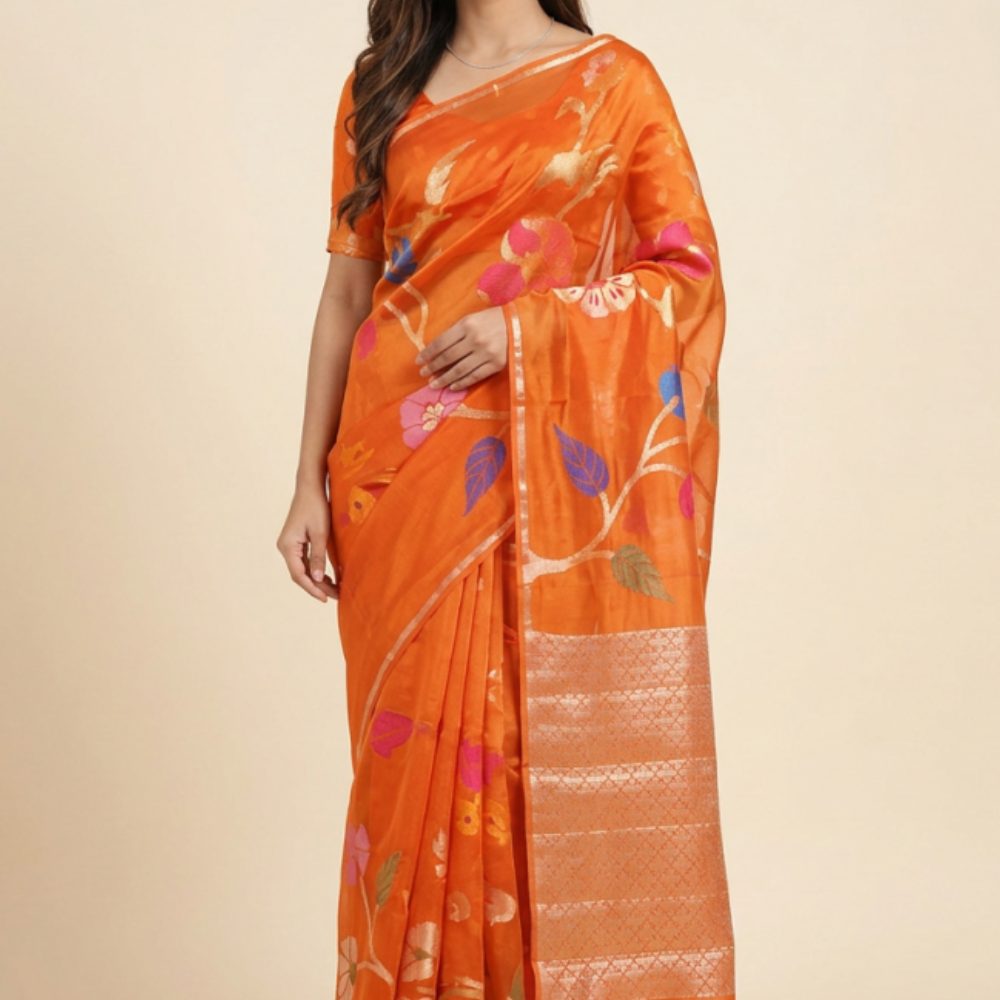 Viscose organza saree with zari woven floral brocade and meenakari detailing with rich tissue brocade pallu
