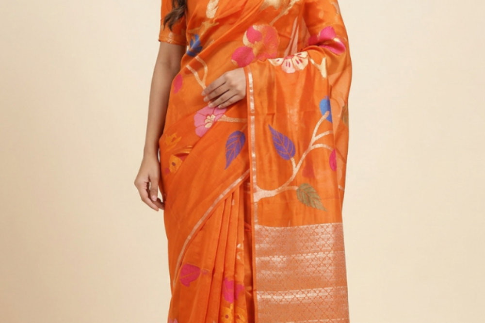 Viscose organza saree with zari woven floral brocade and meenakari detailing with rich tissue brocade pallu
