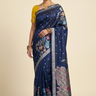Banarasi Munga silk saree with all-over zari woven floral motifs and rich brocade pallu.
