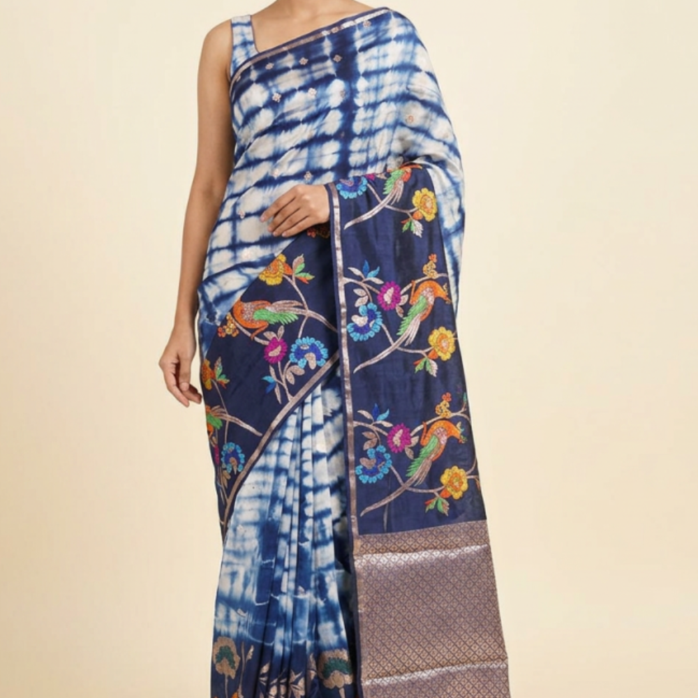 Banarasi organza saree with allover Shibori prints and floral meenakari zari woven border
