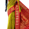 Handloom Gadwal silk cotton saree with all-over zari buttis and rich brocade pallu.
