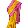 Handloom Gadwal silk cotton saree with all-over zari buttis and rich brocade pallu.
