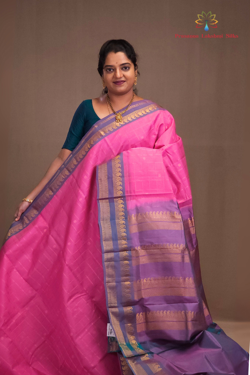 Lotus pink Gadwal silk cotton saree with Rama Green zari-woven border