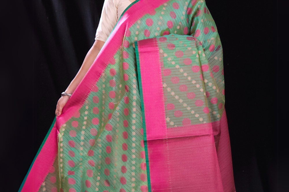 Green and pink fancy saree with zari borders