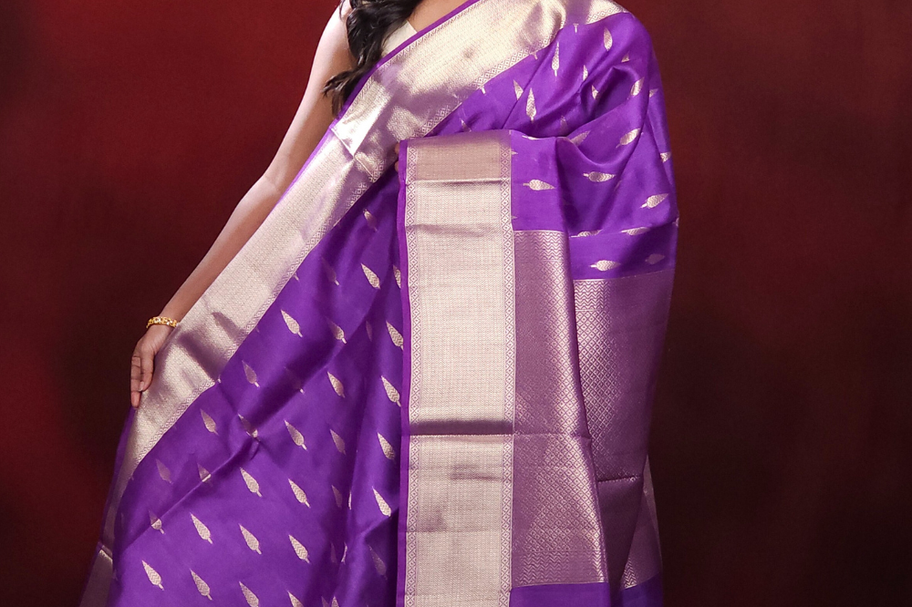 Kora sareeall-over Zari woven leaf motifs 