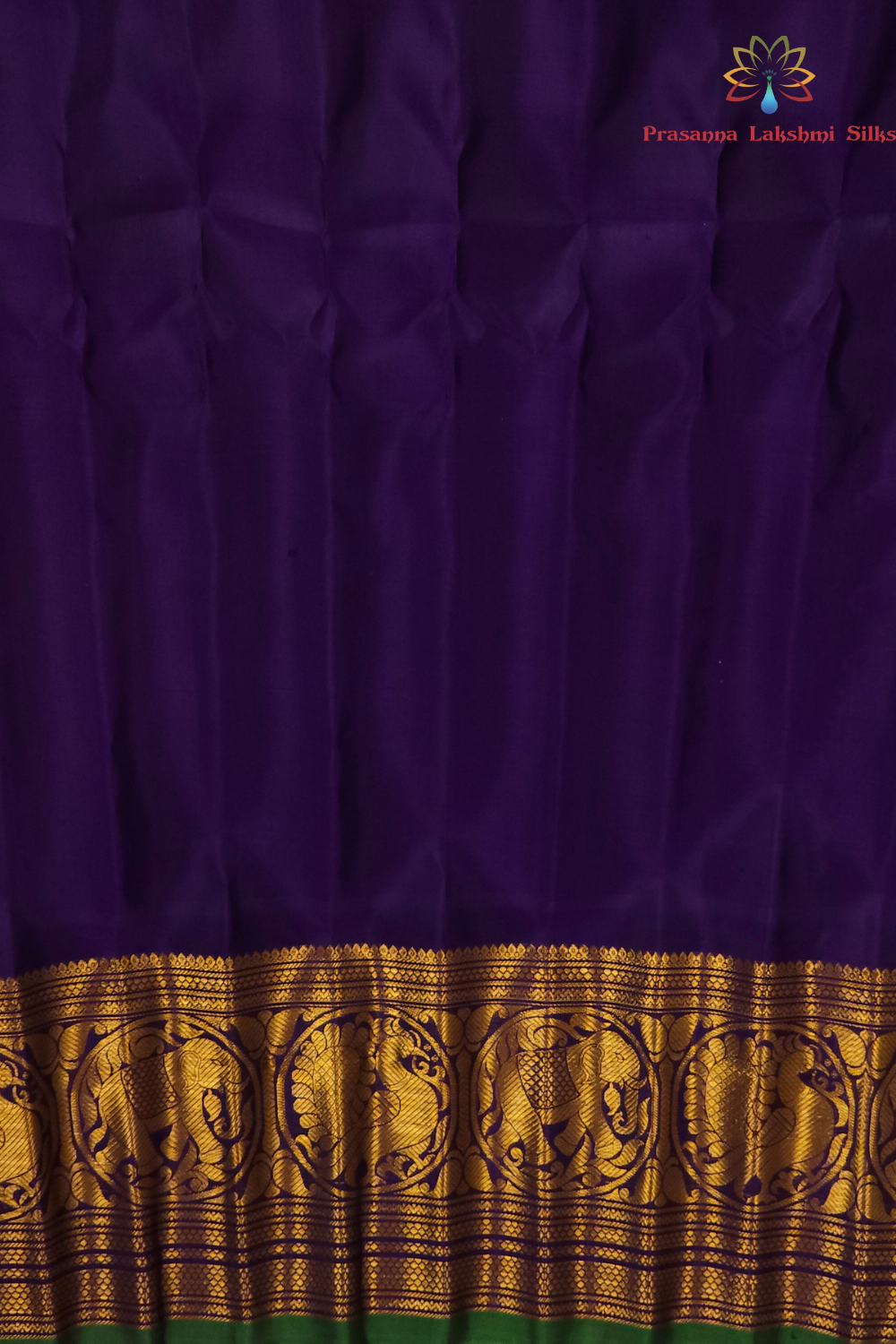Mint Green Pure Handloom Gadwal Silk Saree with dark blue turning borders and rich zari brocade pallu

