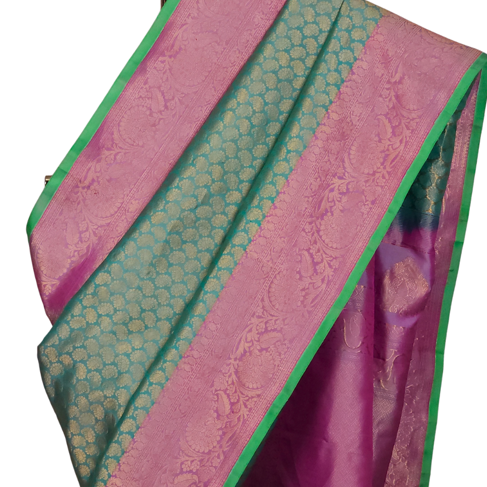 Mint Green Pure Handloom Gadwal Silk Saree with lavender turning borders and rich zari brocade pallu

