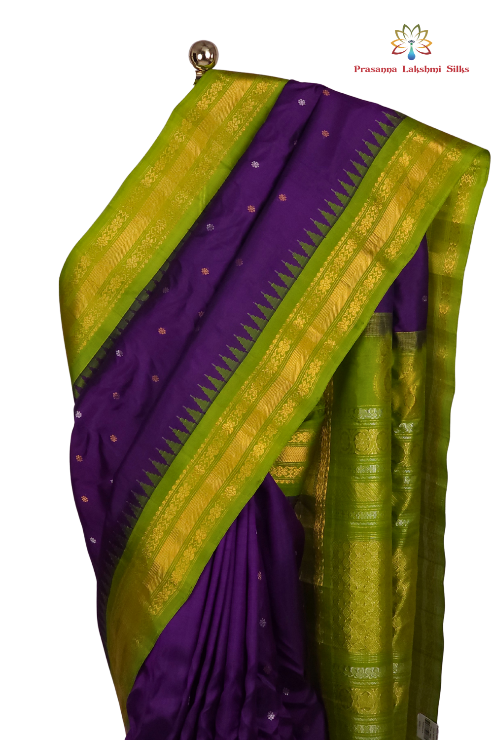 Model draping a Silk Mark certified violet and olive green Gadwal silk saree, highlighting the luxurious texture and elegant contrast blouse.