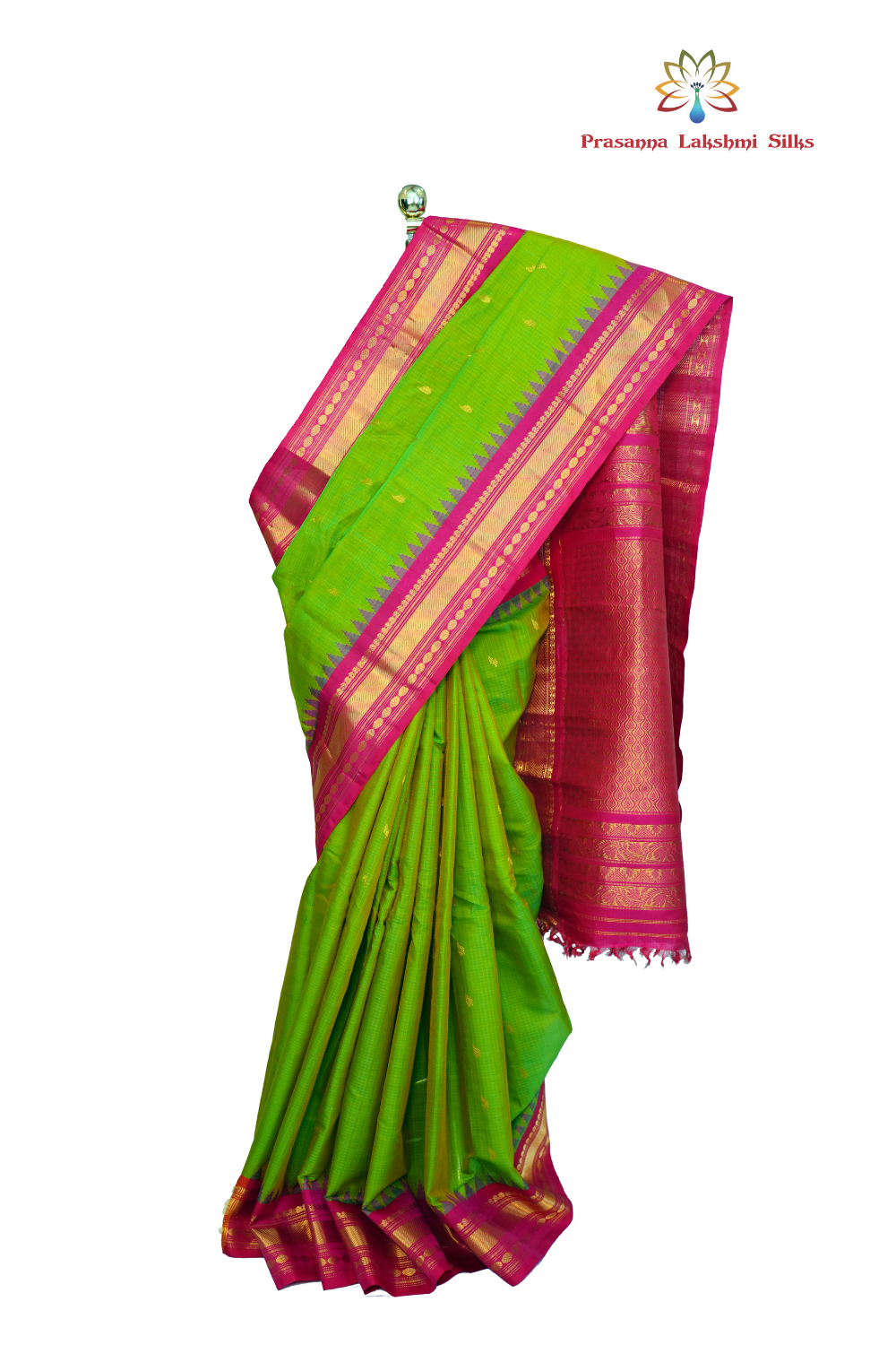 Handloom Gadwal silk cotton saree with all-over zari buttis and rich brocade pallu.
