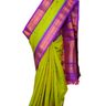 Handloom Gadwal silk cotton saree with all-over zari buttis and rich brocade pallu.
