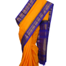 Handloom Gadwal silk cotton saree with all-over zari buttis and rich brocade pallu.
