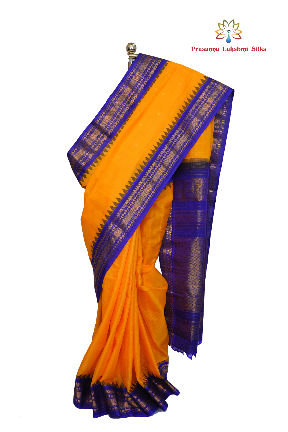 Handloom Gadwal silk cotton saree with all-over zari buttis and rich brocade pallu.

