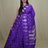 Banarasi Munga silk saree with all-over leaf-shaped zari woven motifs and gold/silver floral borders.
