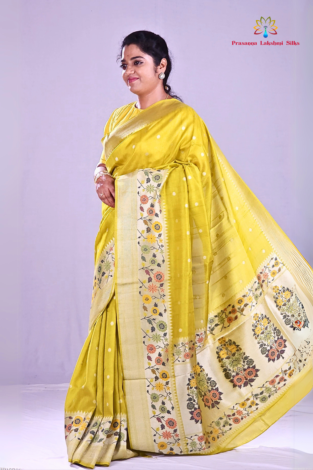 Lime Green"Banarasi Tussar Georgette saree with floral borders."
