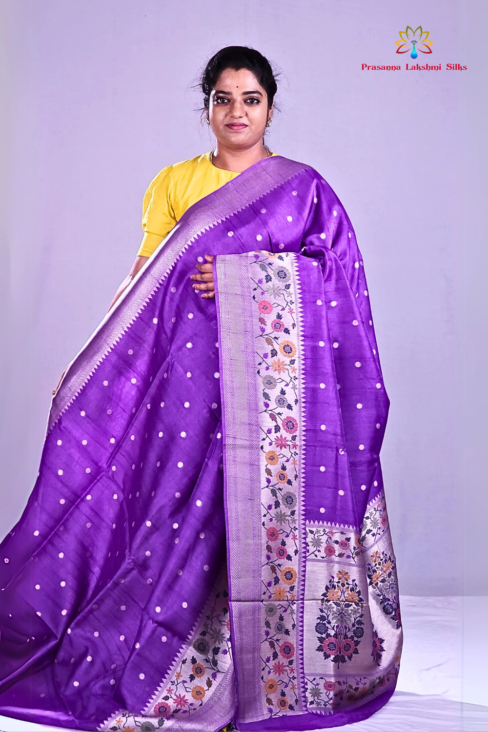 Lavender"Banarasi Tussar Georgette saree with floral borders."