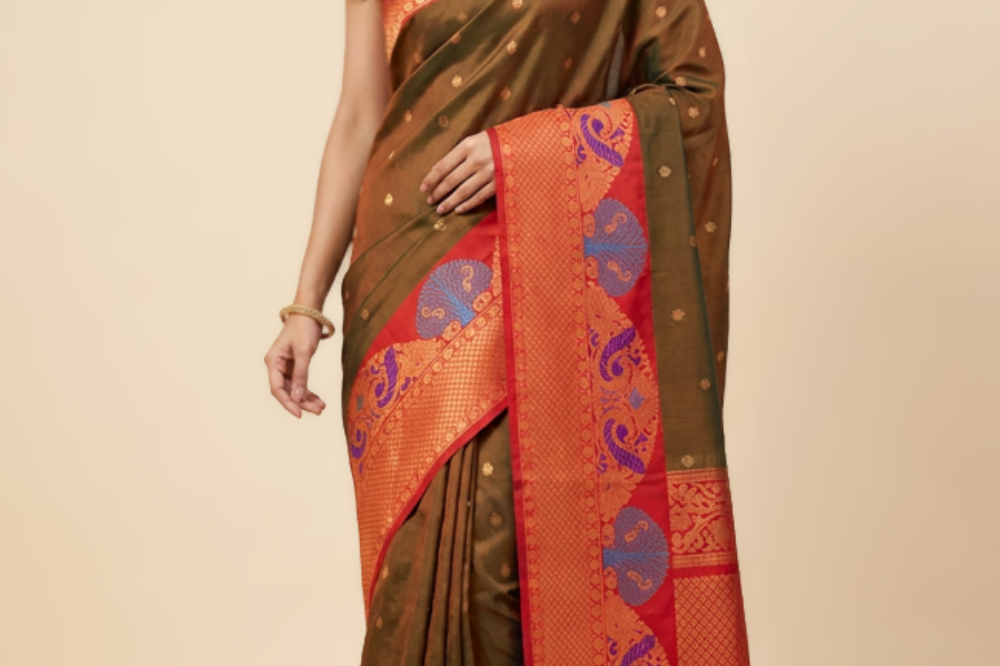 Elegant traditional Gadwal Silk Saree with rich zari weaving, meenakari border detailing, brocade pallu, perfect for weddings and festive occasions.