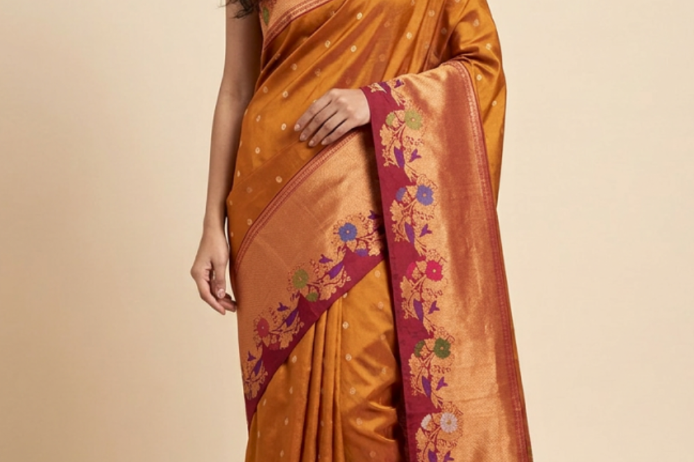 Gadwal Silk Saree featuring all-over zari motifs, intricate meenakari border, rich zari brocade pallu, and contrast blouse.

