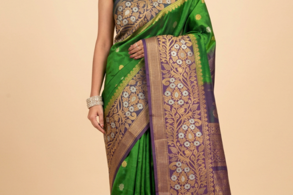 Gadwal Silk Saree featuring all-over zari motifs, intricate meenakari border, rich zari brocade pallu, and contrast blouse.
