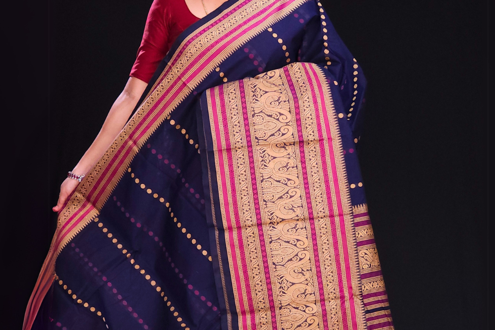 Traditional Kanjeevaram cotton saree with rich zari border
