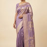 Banarasi Munga silk saree with all-over zari woven floral motifs and rich brocade pallu.
