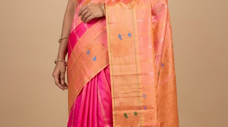 Pure handloom Gadwal silk saree with all-over zari motifs and intricate turning borders
