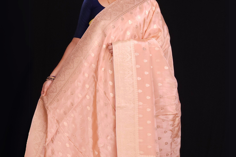 peach Subtle munga tissue saree in pastel tones