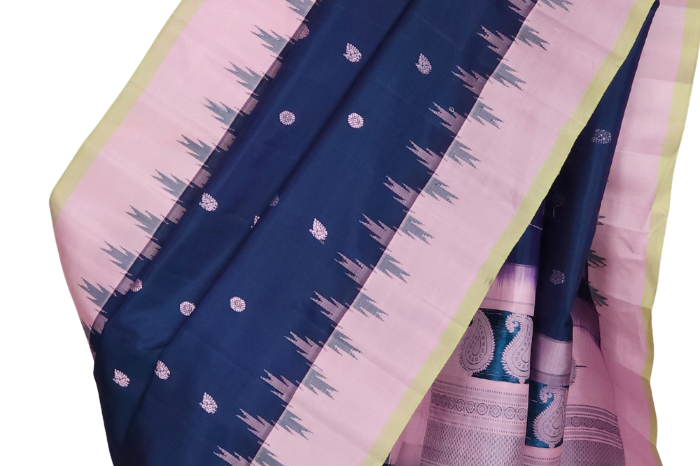 Peacock blue handloom Gadwal pure silk saree with lotus pink zari border and rich brocade pallu

