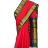 Handloom Gadwal silk cotton saree with all-over zari buttis and rich brocade pallu.
