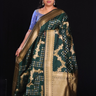 Dark Green"semi Banaras saree with Zari border"