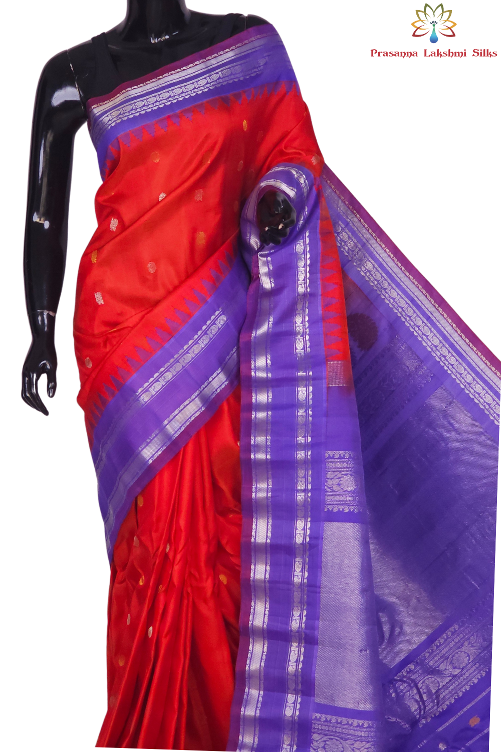 Silk Mark certified Gadwal silk saree in dark orange with lavender blouse and intricate zari motifs