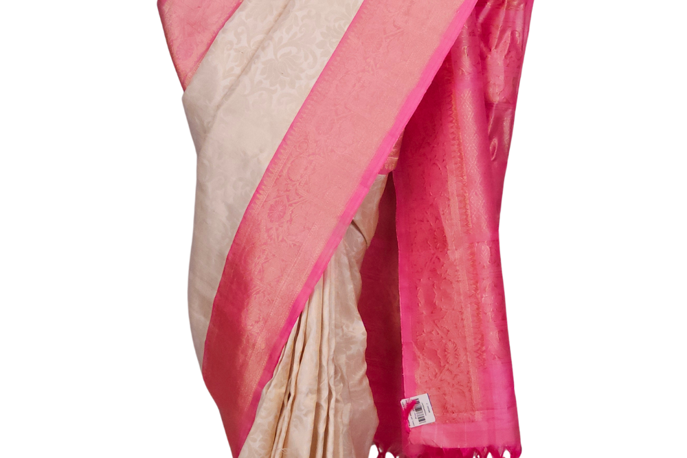 Silk Mark certified Gadwal silk saree draped on model, showing rich zari brocade pallu and baby pink blouse
